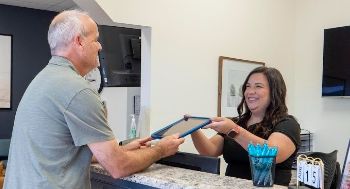 Man checking in for his dental appointment